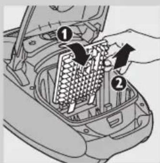 Diagram of car interior showing two labeled parts with arrows indicating movement or assembly.