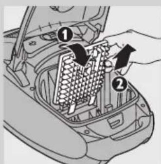 Diagram of car interior showing two labeled parts with arrows indicating movement or assembly.