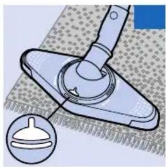 Illustration of a cleaning tool with a handle and circular component, shown with an inset magnified view (no text or symbols)