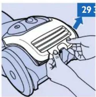 Illustration of hands operating a mechanical device with a blue arrow pointing to the number 29 (no text or symbols on the device itself)