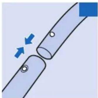 Diagram of a pipe joint with blue directional arrows indicating flow or movement (no text or symbols)