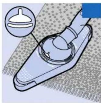 Illustration of a hand holding a small mechanical component with a magnified inset showing a tip (no text or symbols)