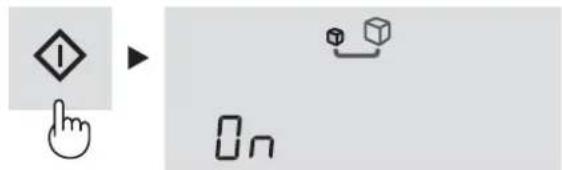Diagram showing a hand cursor clicking a symbol with an exclamation mark, next to a 3D cube and a button labeled 'On'