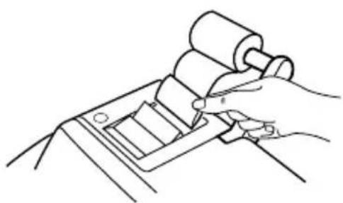 Line drawing of a hand using a cylindrical tool to press or install a mechanical component (no text or symbols).