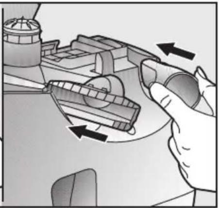 Illustration of a hand operating a mechanical device with directional arrows indicating motion (no text or symbols)