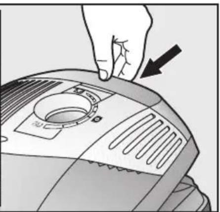 Illustration of a hand pressing down on a device with a black arrow indicating the action (no text or symbols present)