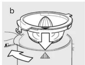 Diagram of a mechanical device with a central knob and directional arrow, no text or symbols present