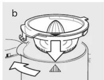 Diagram of a mechanical device with a central knob and directional arrow, no text or symbols present