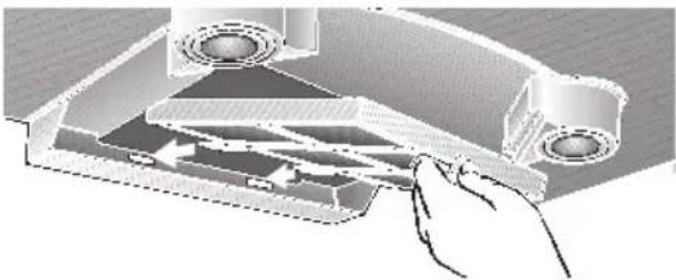 Diagram of a hand inserting a component into a device housing (no text or symbols visible)