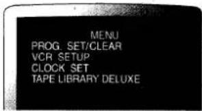 MENU PROG. SET/CLEAR VCR SETUP CLOCK SET TAPE LIBRARY DELUXE