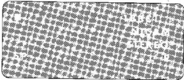 Vue microscopique d'un matériau granulaire avec des particules sombres uniformes sur fond clair (sans texte ni symboles)