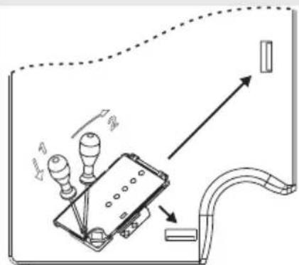 Diagram showing a device with heat exchanger and connected to a wall-mounted device, illustrating electrical or mechanical connections.