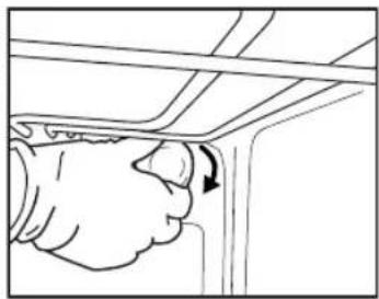 Line drawing of a hand inserting a valve into a wall, with an arrow indicating the direction (no text or symbols present).