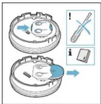 Diagram illustrating a mechanical device with labeled parts and warning symbols, including 'i' and 'x' indicators.