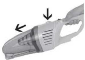Close-up of a white handheld device with ventilation slots and a handle, showing no visible text or symbols.