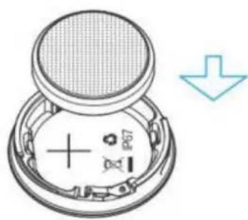 Diagram of a device component with labeled pins and a downward arrow indicating direction or change.