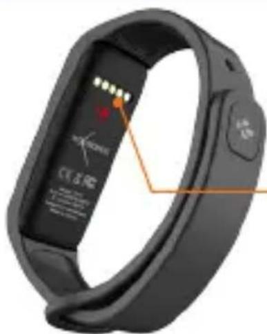 Close-up of a black fitness tracker with visible brand logo and control buttons