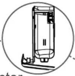 Technical line drawing of a cylindrical device with a base and handle, enclosed in a circle (no text or symbols)