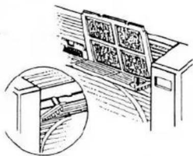 Line drawing of a room with storage racks and a window, showing an inset close-up of a wall detail (no text or symbols)