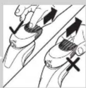 Illustration of two hands holding a tool with directional arrows indicating movement or force (no text or symbols).