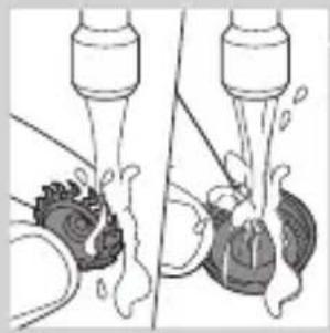 Diagram showing two mechanical components with fluid flow, no text or symbols present