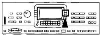 Line drawing of a control panel with buttons and a central touchscreen device (no text or symbols)