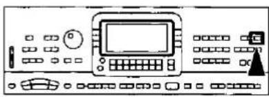 Line drawing of a control panel with buttons and a monitor (no text or symbols)