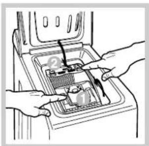 Illustration of hands inserting a device into a container with internal components (no text or symbols)