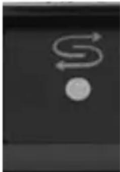 Close-up of a computer mouse with a circular button and curved scroll on a dark background (no text or symbols)