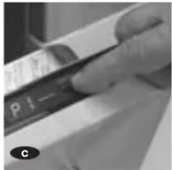 Close-up of a hand holding a pen over a surface with visible text and symbols (no readable text or symbols)