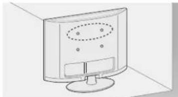 Line drawing of a computer monitor with a stand and dotted oval pattern on the screen (no text or symbols)