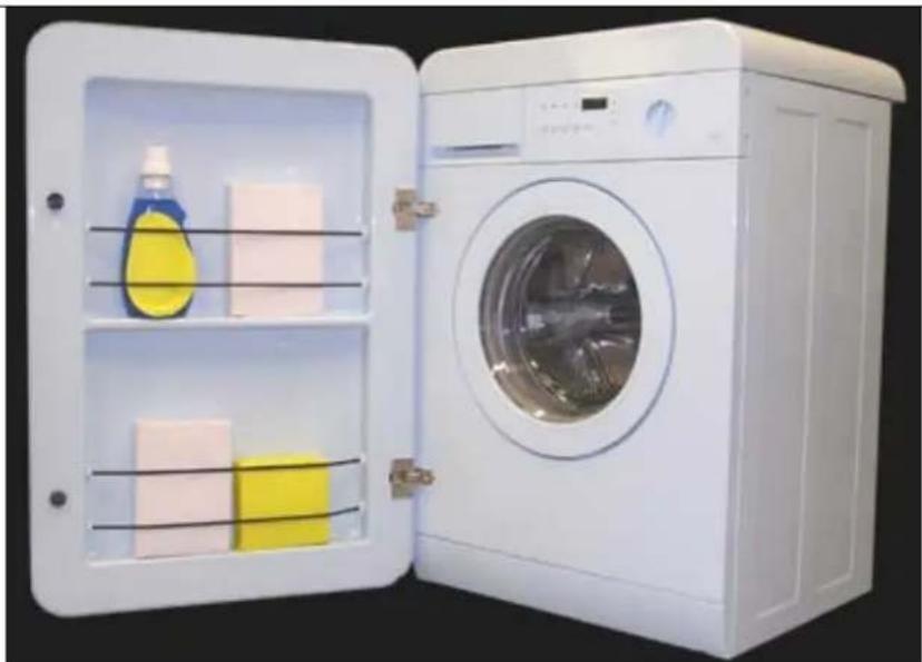 White washing machine with open doors showing interior compartments containing colored blocks (no text or symbols visible).