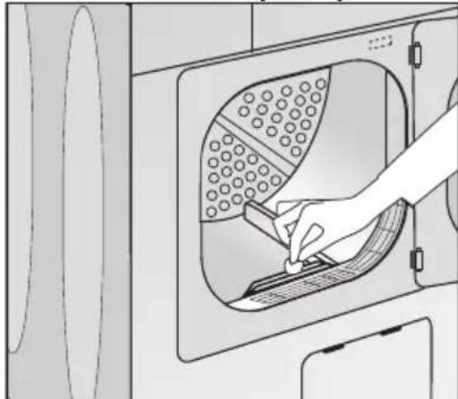 Line drawing of a hand using a tool to clean or install a washing machine.