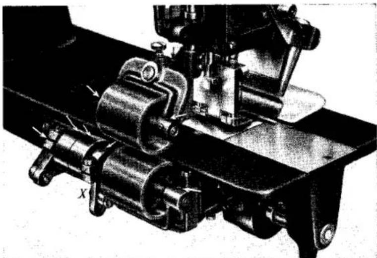 Schéma d'assemblage mécanique montrant un tour avec des composants rotatifs et une base de montage (sans texte ni symboles visibles).