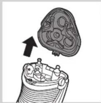 Diagram of a mechanical component with an arrow indicating direction, showing internal parts and a top view (no text or symbols)