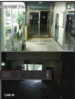 Interior view of a building hallway with glass doors and windows, no visible text or symbols