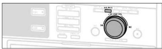 Control panel interface with labeled buttons and a rotary knob, likely for industrial or electronic equipment control.