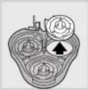 Mechanical gear assembly diagram showing internal components and a directional arrow (no text or labels).