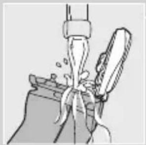 Illustration of a hand pouring liquid into a container with a knife inserted (no text or symbols).
