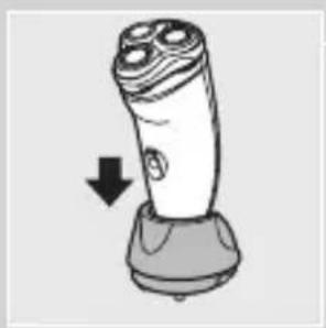 Illustration of a hand holding a three-pin electric shaver with a downward arrow indicating compression (no text or symbols).
