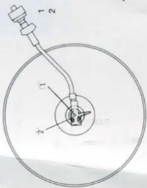 Technical diagram of a mechanical or electrical component with labeled parts 1, 2, and numbered annotations