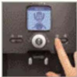 Close-up of a hand pressing a button on a digital device (no visible text or symbols)