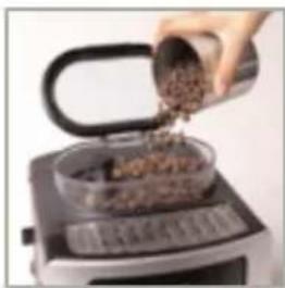 Person pouring chopped granular material into a grating machine (no text or symbols visible)