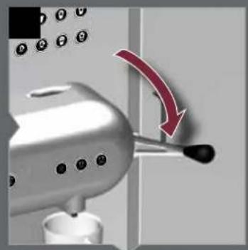 Close-up of a metallic coffee maker with a red arrow indicating rotation or adjustment (no text or symbols visible)
