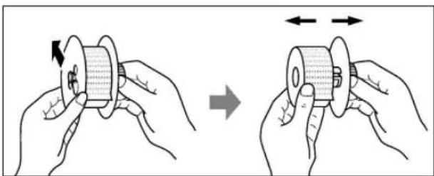 Illustration showing two hands holding a circular object with directional arrows indicating motion (no text or symbols)