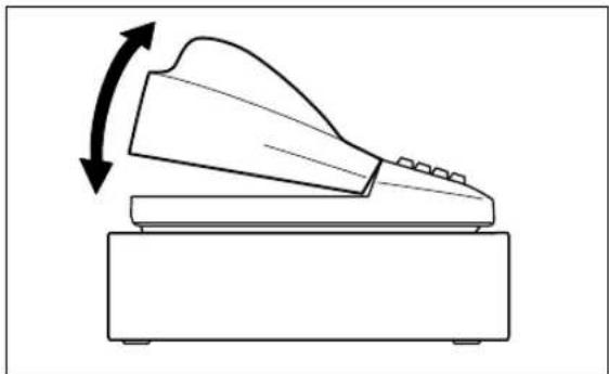 Line drawing of a slide roll with an arrow indicating motion (no text or symbols)