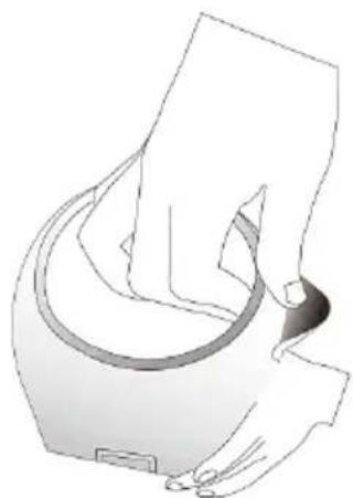 Illustration of a hand holding a circular device with a handle, no text or symbols present
