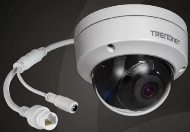 White TREAD NET security camera with attached network ports (no visible text or symbols on body)