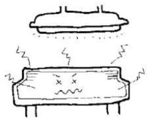 Simple line drawing of a device with a lid and a wavy base, emitting sound waves (no text or symbols)