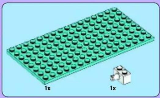 Green LEGO base with 1x loadings, accompanied by a small 3D cube diagram (no text or symbols on the base)
